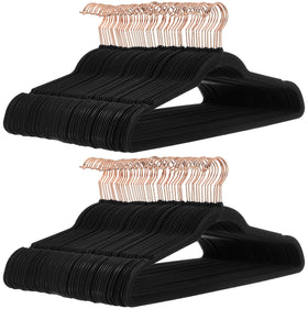 Amazon Basics slim velvet non-slip hangers show space-saving closet organization for shirts and jackets.