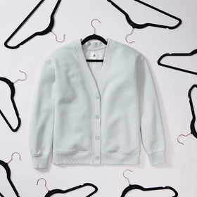 Amazon Basics black and rose gold hangers add style while organizing a wardrobe.