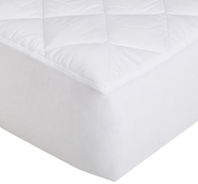 Amazon Basics topper care shot demonstrates machine wash and dry for easy maintenance.