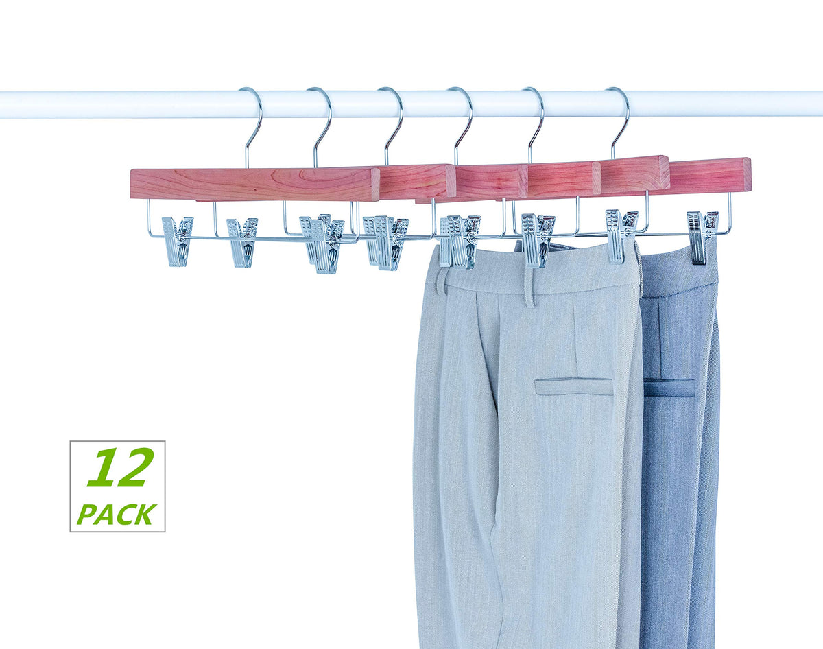 Amber Home cedar hanger measures 14W by 6.7H inches for trousers