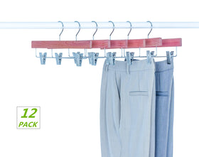 Amber Home cedar hanger measures 14W by 6.7H inches for trousers
