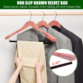 Amber Home cedar hanger with inward-curved design supports jackets and suits.