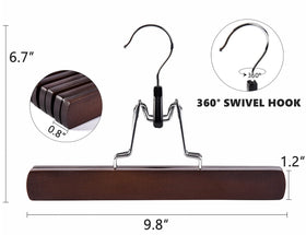 Amber Home crafted walnut hanger with non-slip velvet clamp for secure hold.
