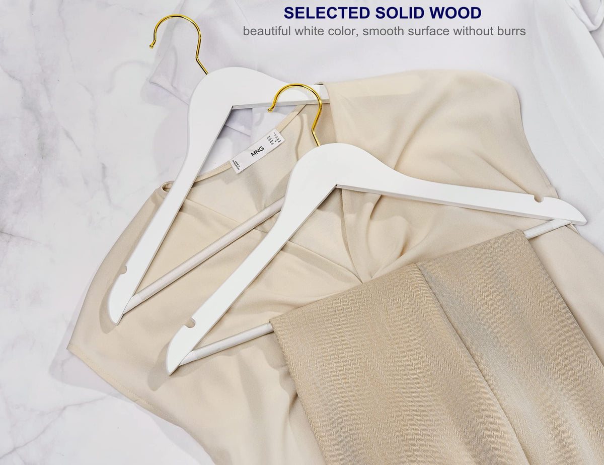 Amber Home white wood hanger with gold hook, grooved notches for delicate straps.
