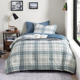 AMBERSPACE blue-grey plaid comforter on bed illustrating cozy teen bedroom style