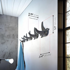 Ambipolar decorative bird hook in entryway adding character and storage