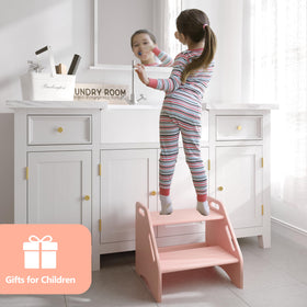 AMBIRD pink two-step stool adds color to bathroom routines.