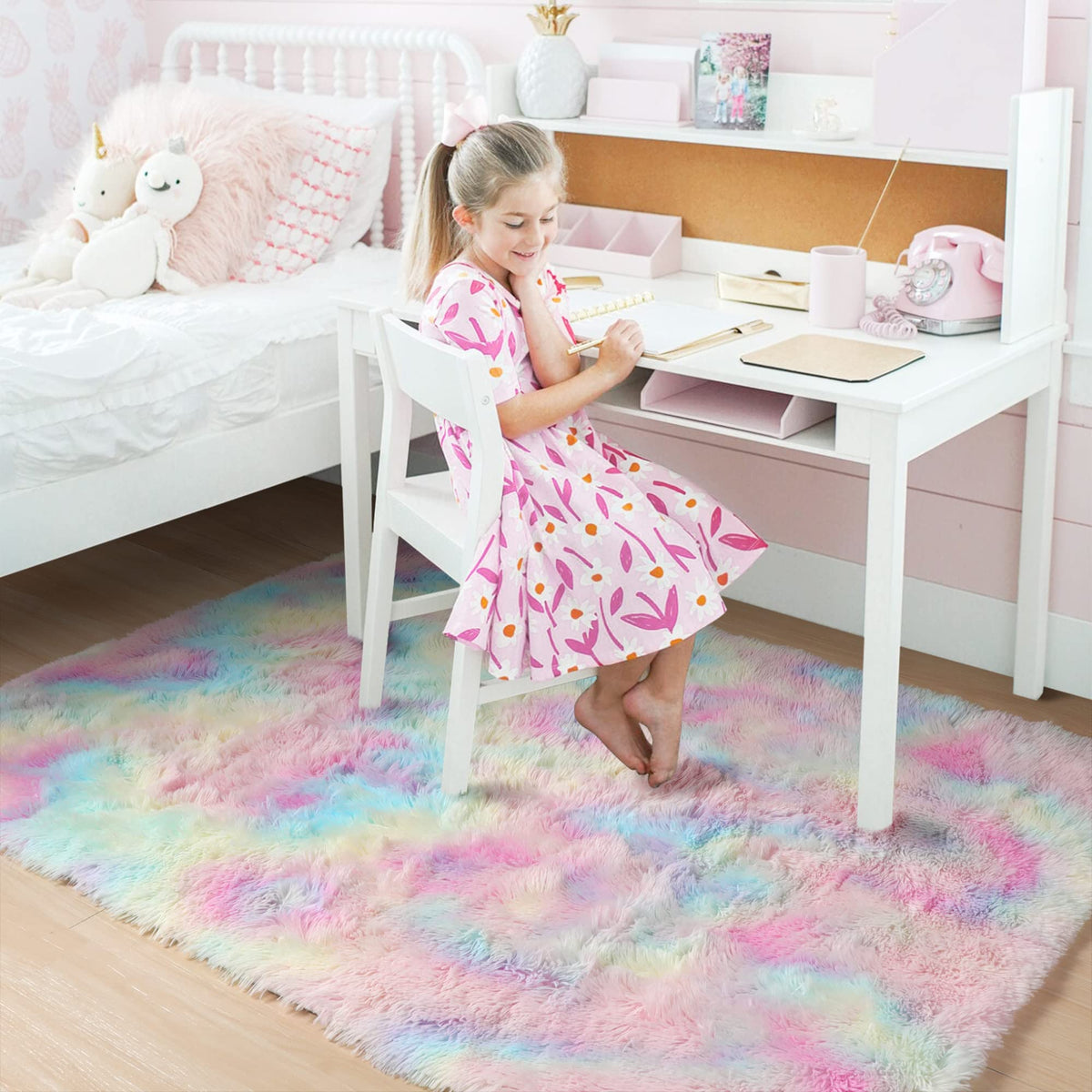 Amdrebio Rainbow Pastel Kids Rug features non-slip backing to guard floors.