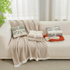 Amélie Home chenille throw in beige complements calm spaces.