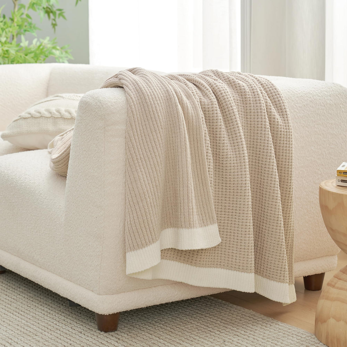 Amélie Home chenille throw is gift-ready for housewarmings and birthdays.