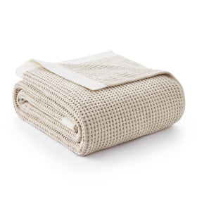Amélie Home chenille throw with ultra-soft chenille for year-round warmth.