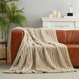 55x70 inch Amélie Home throw provides generous sofa coverage