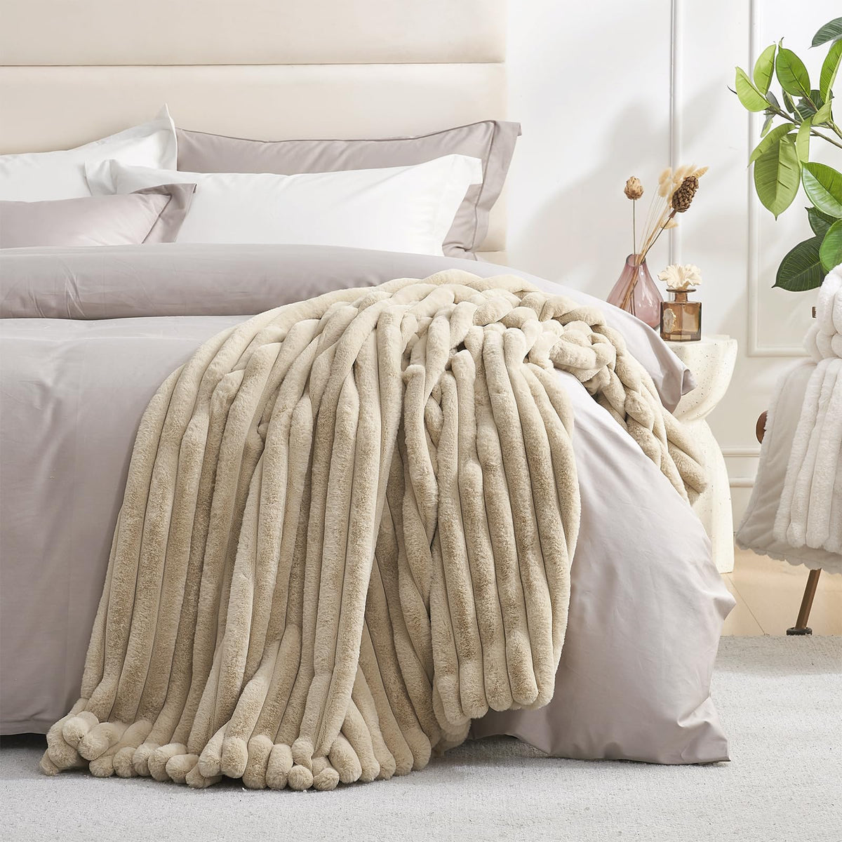 Jacquard stripe detail on Amélie Home faux fur throw blanket