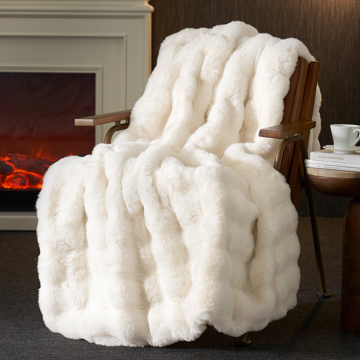 Amélie Home faux fur throw with bubble texture in cream for cozy living room warmth.