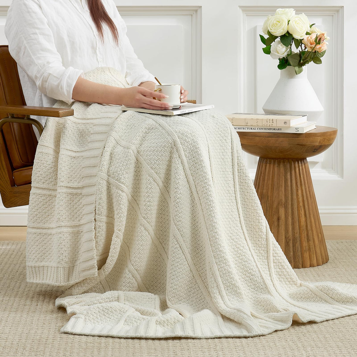 Amélie Home blanket at bed foot for added texture and comfortable layer