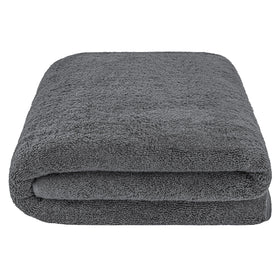 American Soft Linen towel shown with bath essentials for a spa-like routine.