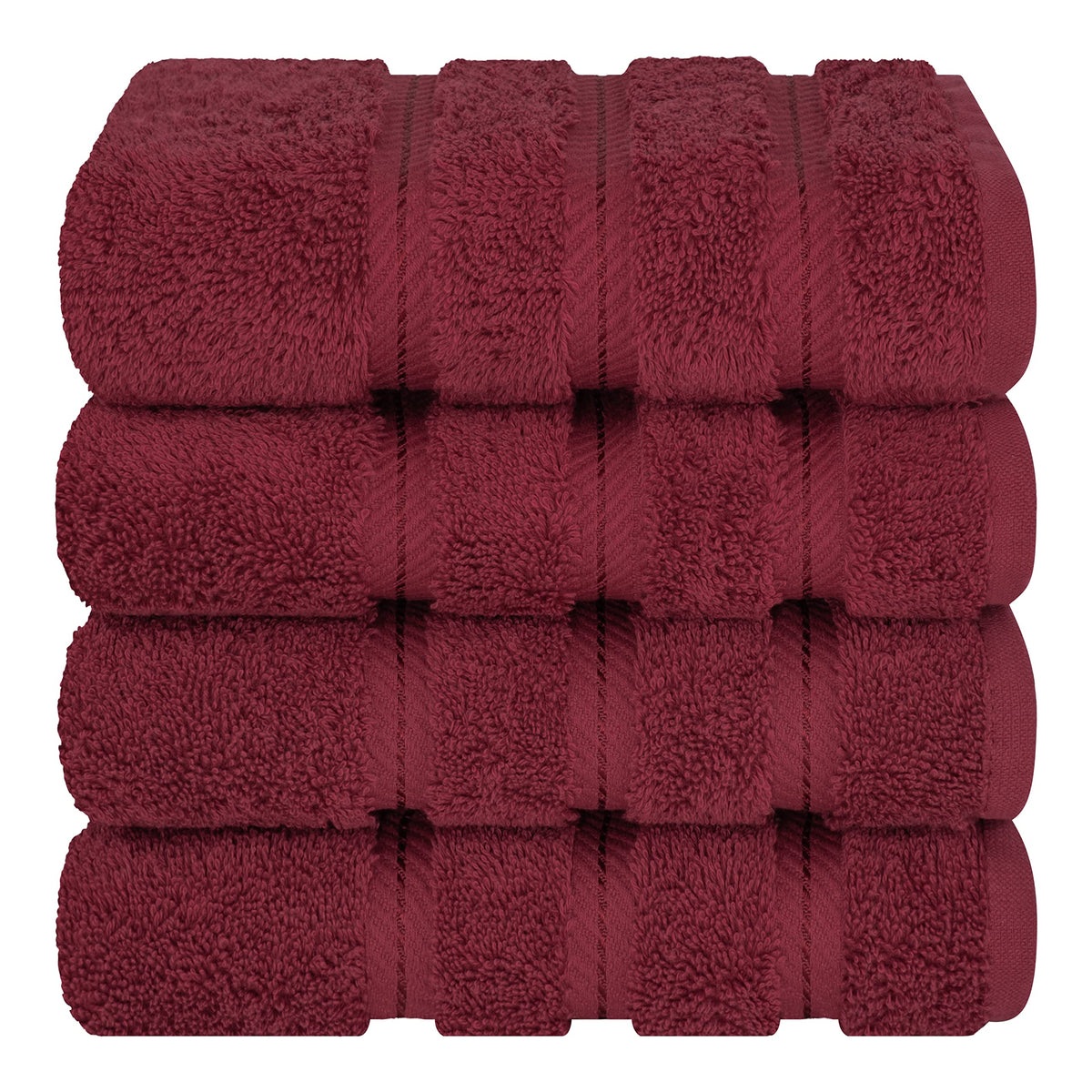 American Soft Linen Bordeaux red towels folded in a basket for guest use.