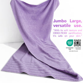Lilac bath towel from American Soft Linen flat lay emphasizing color and premium texture.