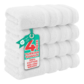 American Soft Linen luxury hand towels set laid flat to show 16x28 size and plush texture