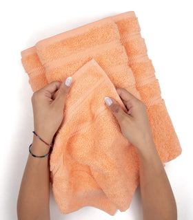 American Soft Linen peach towel close-up edge stitch showcasing durability.
