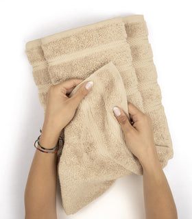 American Soft Linen beige stacked towels showcase dense 600 GSM construction and hotel-like luxury.