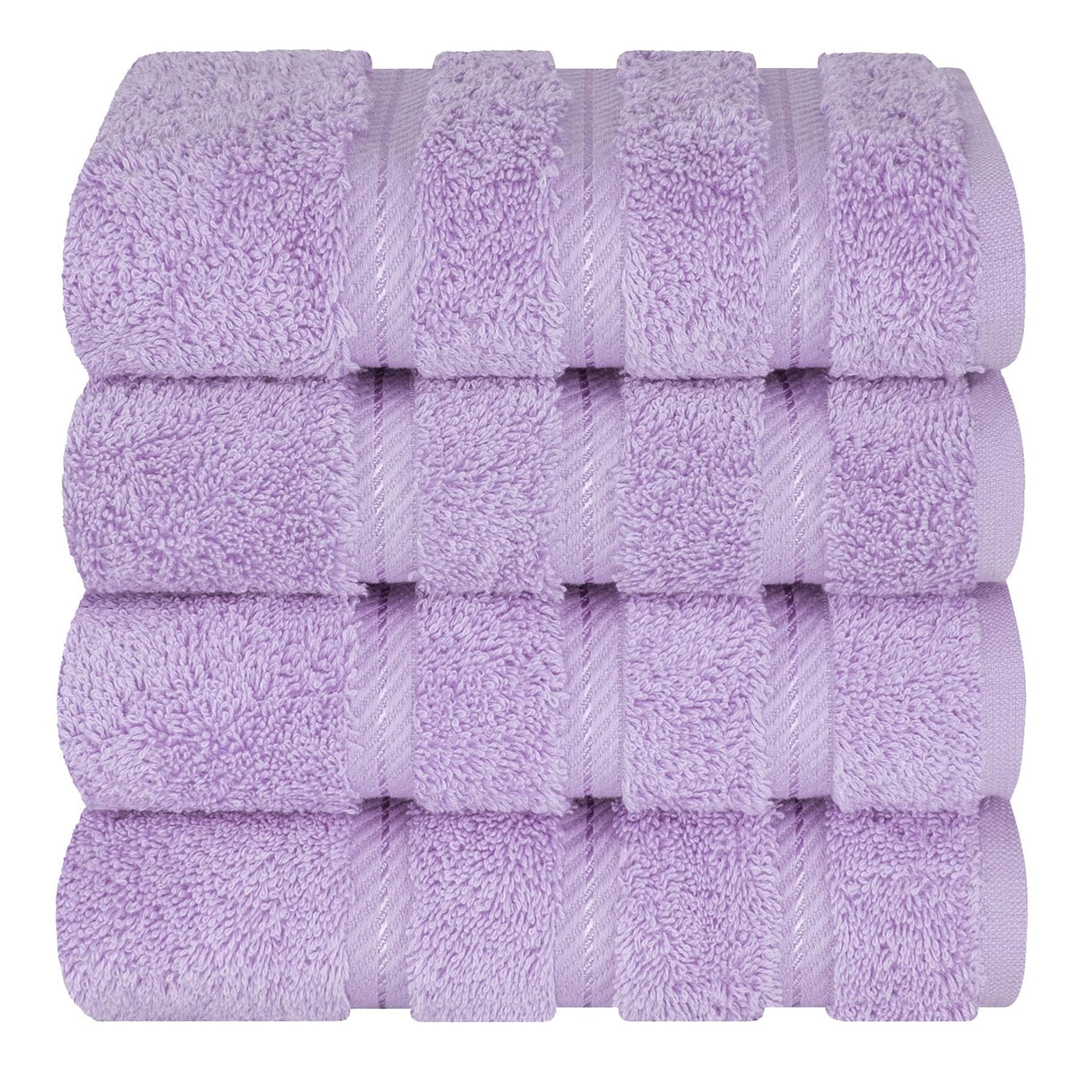 Rolled American Soft Linen towels on a vanity