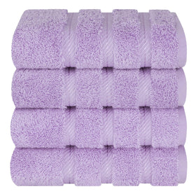 Rolled American Soft Linen towels on a vanity