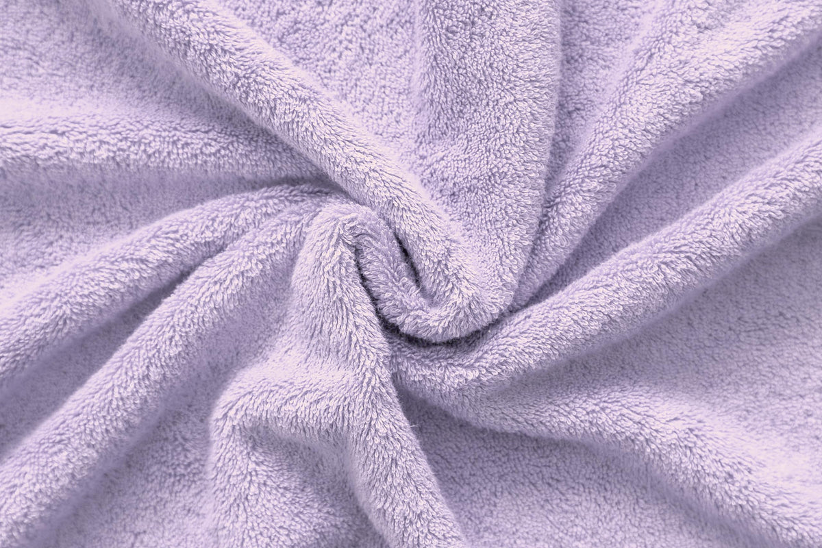 American Veteran Towel set display highlights a four-piece lilac towel collection