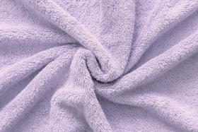 American Veteran Towel set display highlights a four-piece lilac towel collection