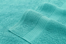 American Veteran Towel turquoise bathroom scene showing luxurious softness for daily routines