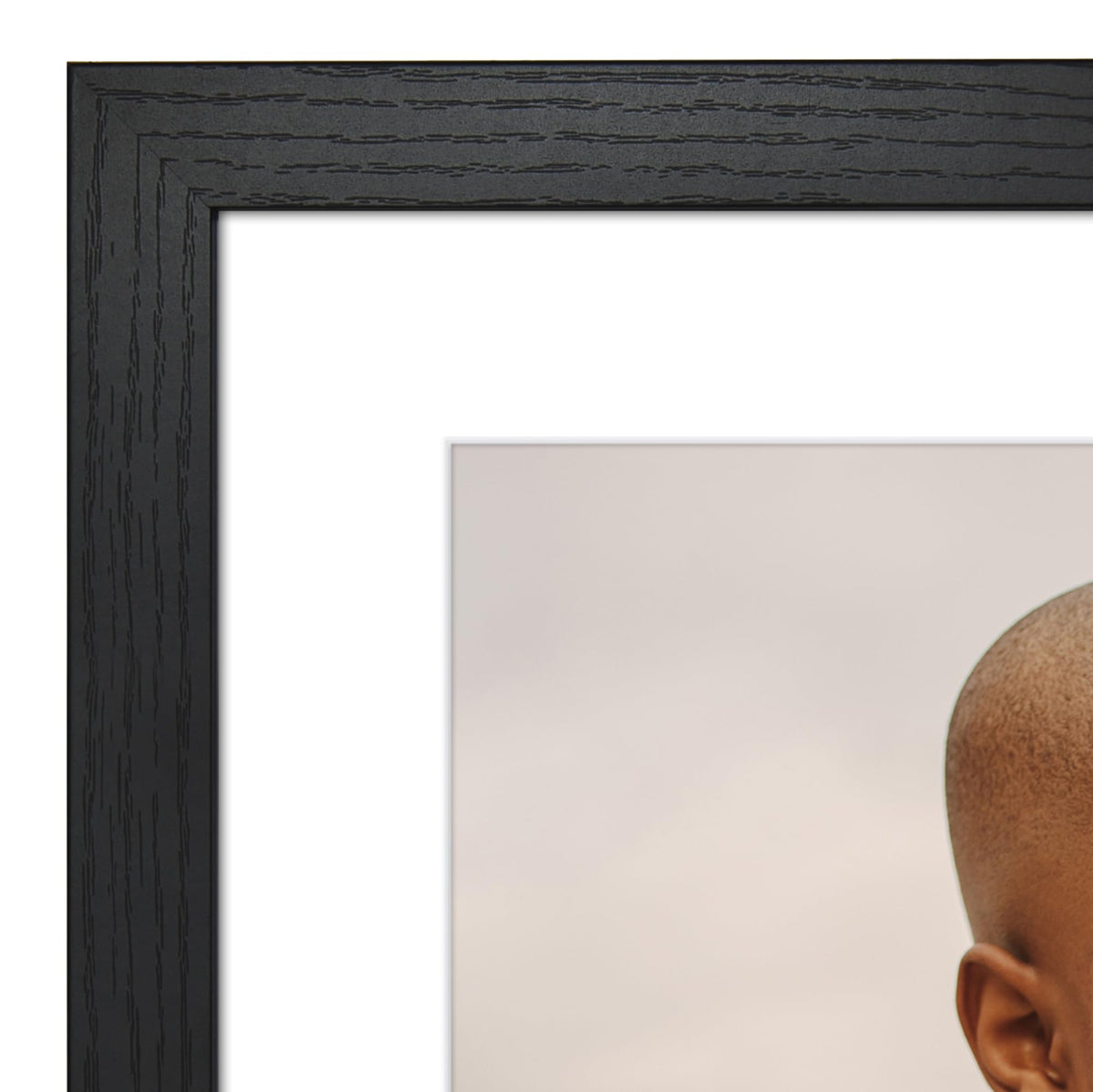 Americanflat backboard keeps photos securely in place for long-lasting displays.