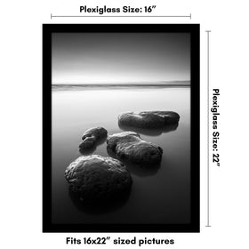 Americanflat black frame with wide molding highlights oversized photos and refined decor.