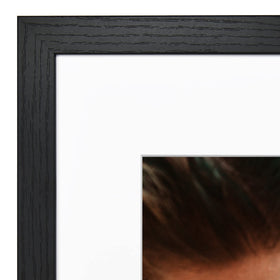 Versatile hanging hardware supports vertical or horizontal wall display
