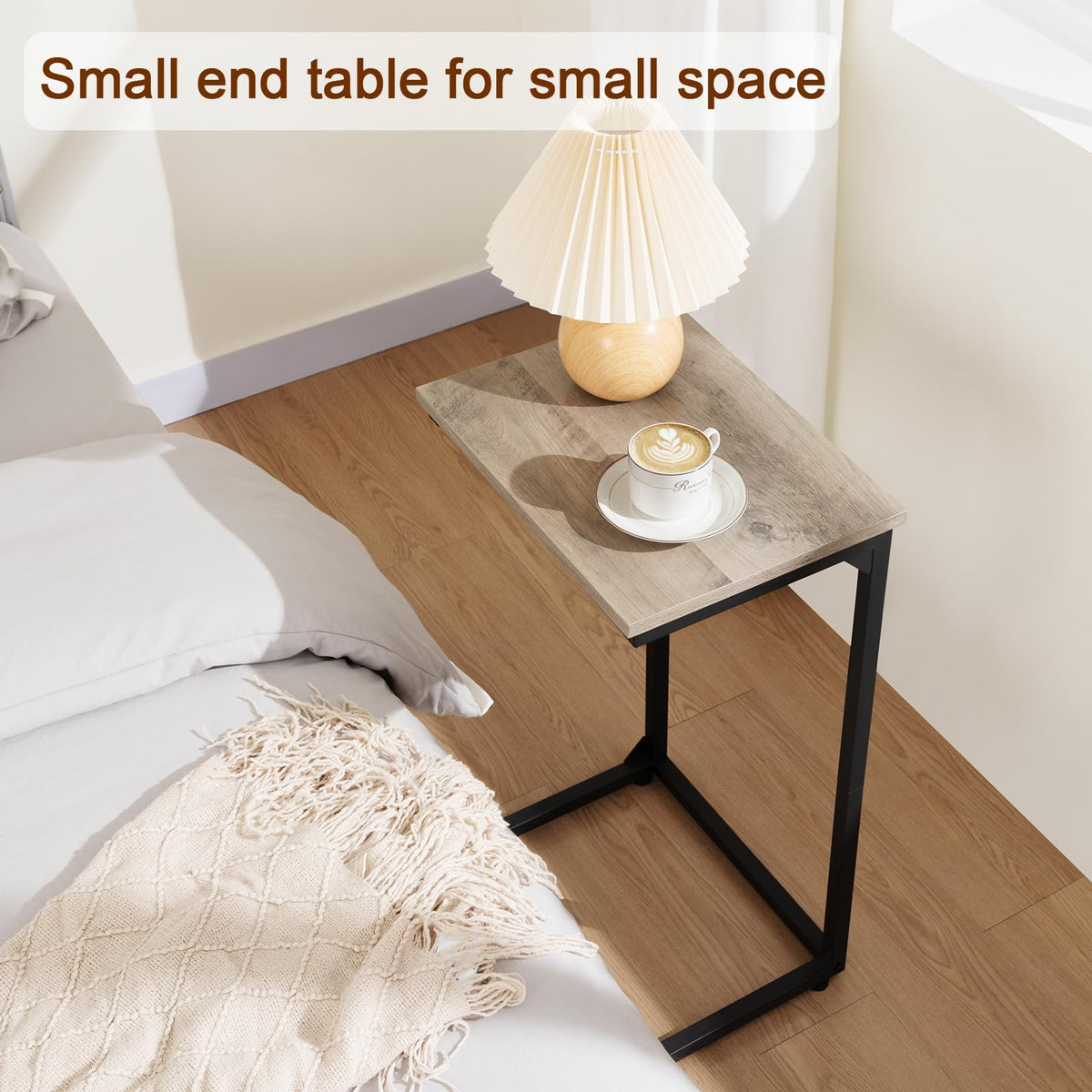 AMHANCIBLE C-shaped end table serving as a slim laptop desk