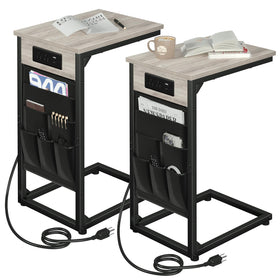 AMHANCIBLE C‑Shaped end table with charging dock slides under a sofa for easy power access.