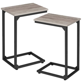 AMHANCIBLE C-shaped side table tucked under the sofa for quick access and neat surfaces.