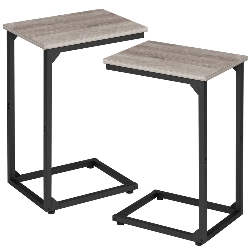AMHANCIBLE C-shaped side table tucked under the sofa for quick access and neat surfaces.