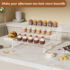 Aminigram jewelry displayed on acrylic risers creates a refined boutique presentation.