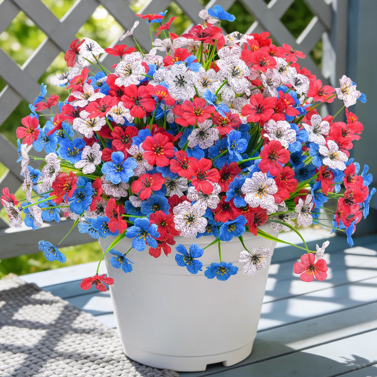 Ammyoo 16pcs artificial flowers in blue for outdoor porch decor with long-lasting color.
