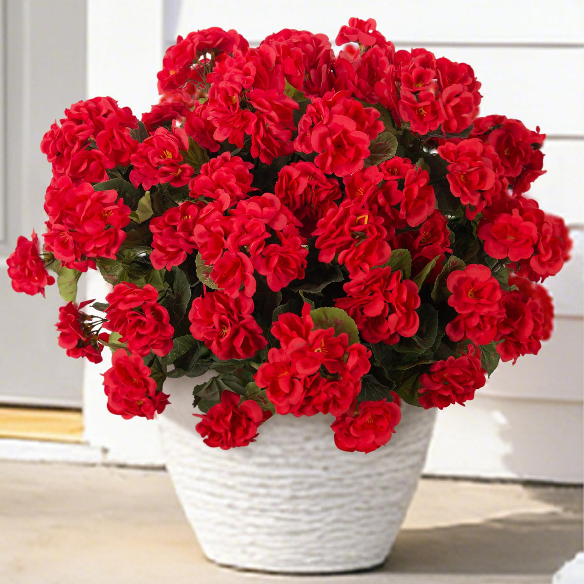 Ammyoo artificial geraniums outdoors with a realistic look for elegant garden decor.