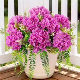 Ammyoo artificial hydrangea flowers in purple with eucalyptus for outdoor decor.