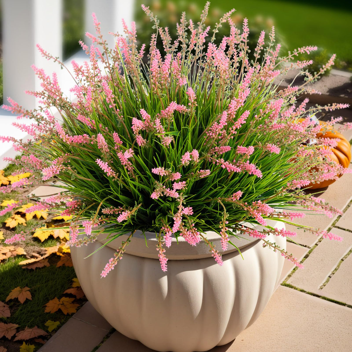 Ammyoo artificial monkey grass 17-inch bundle for porch decor.
