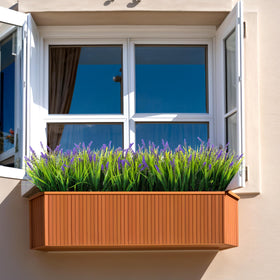 Ammyoo artificial plants with lifelike foliage for year-round outdoor appeal.