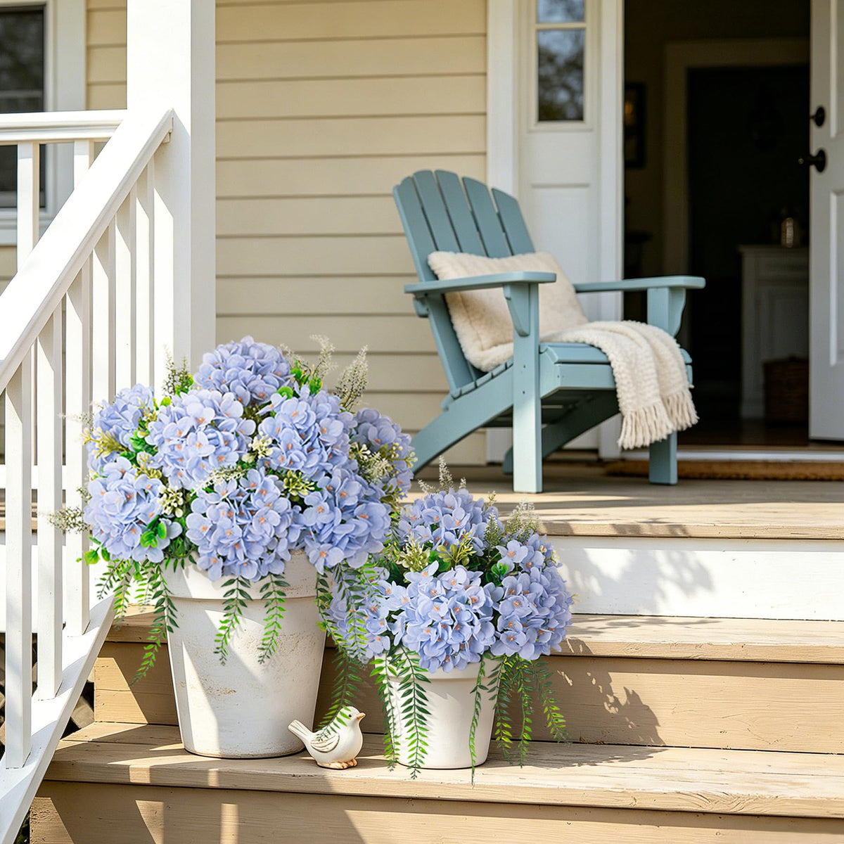 Ammyoo blue hydrangea with greenery, elegant indoor display.