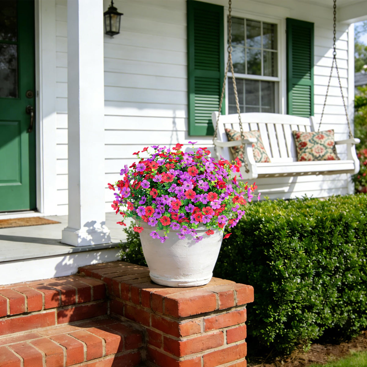 Ammyoo faux daisy and eucalyptus arrangement enhances yard color with low maintenance.