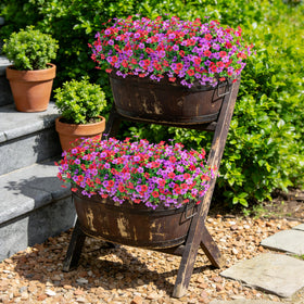 Ammyoo artificial daisy bundles with eucalyptus add UV-resistant color to porch decor.