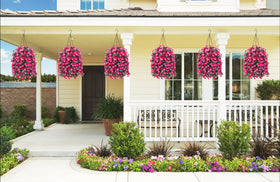 Ammyoo rose red faux daisies in coconut-lined basket for easy outdoor decor.