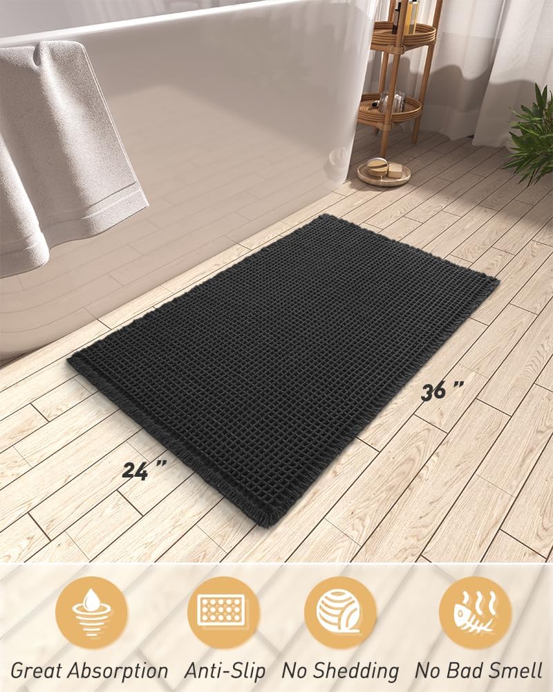 AMOAMI Upgraded Waffle Bath Mat with tassels adds decorative touch.