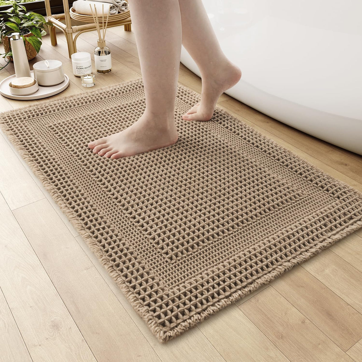 AMOAMI waffle bath mat front view highlights absorbent texture for quick drying.