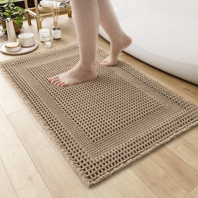 AMOAMI waffle bath mat front view highlights absorbent texture for quick drying.
